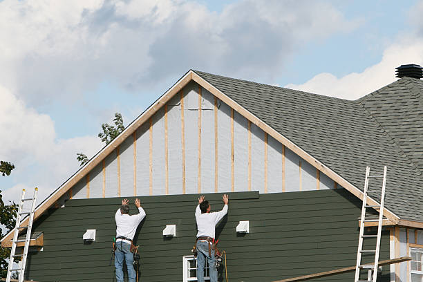 Professional Siding Installation technician working in Bristol, FL